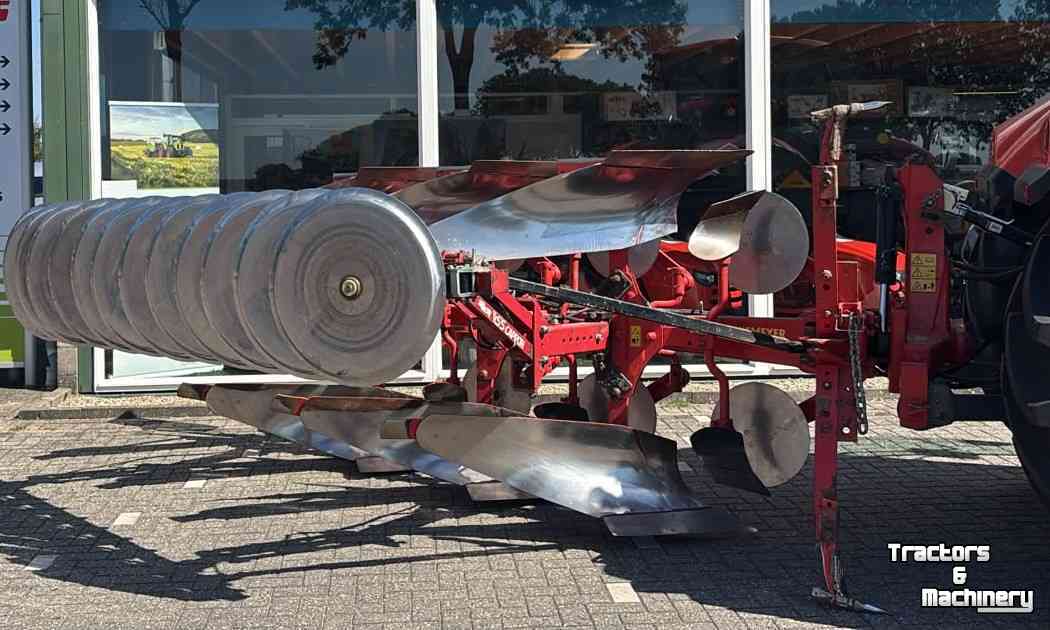Ploegen Niemeyer Delta 3-200 MAIII  3 schaar wentelploeg met vorenpakker
