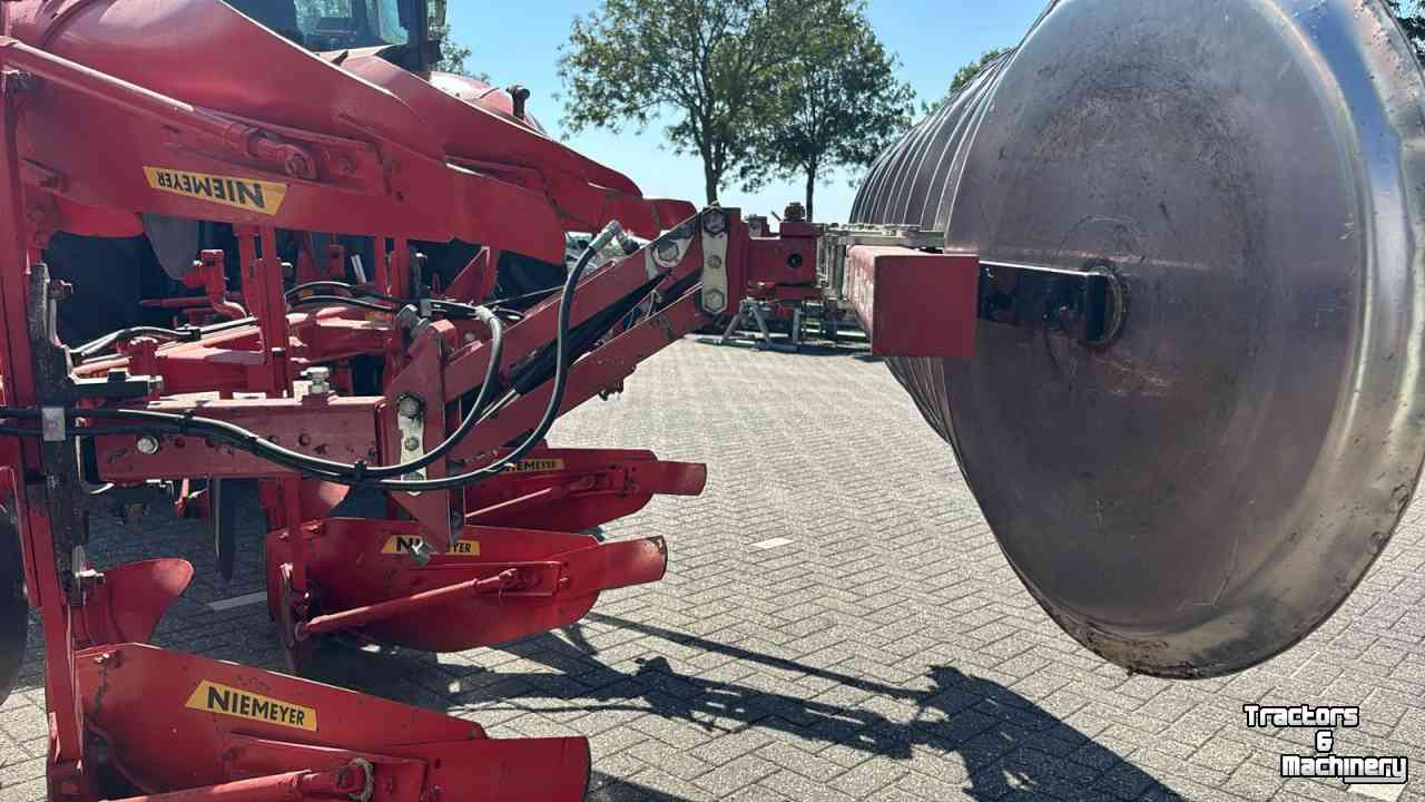 Ploegen Niemeyer Delta 3-200 MAIII  3 schaar wentelploeg met vorenpakker