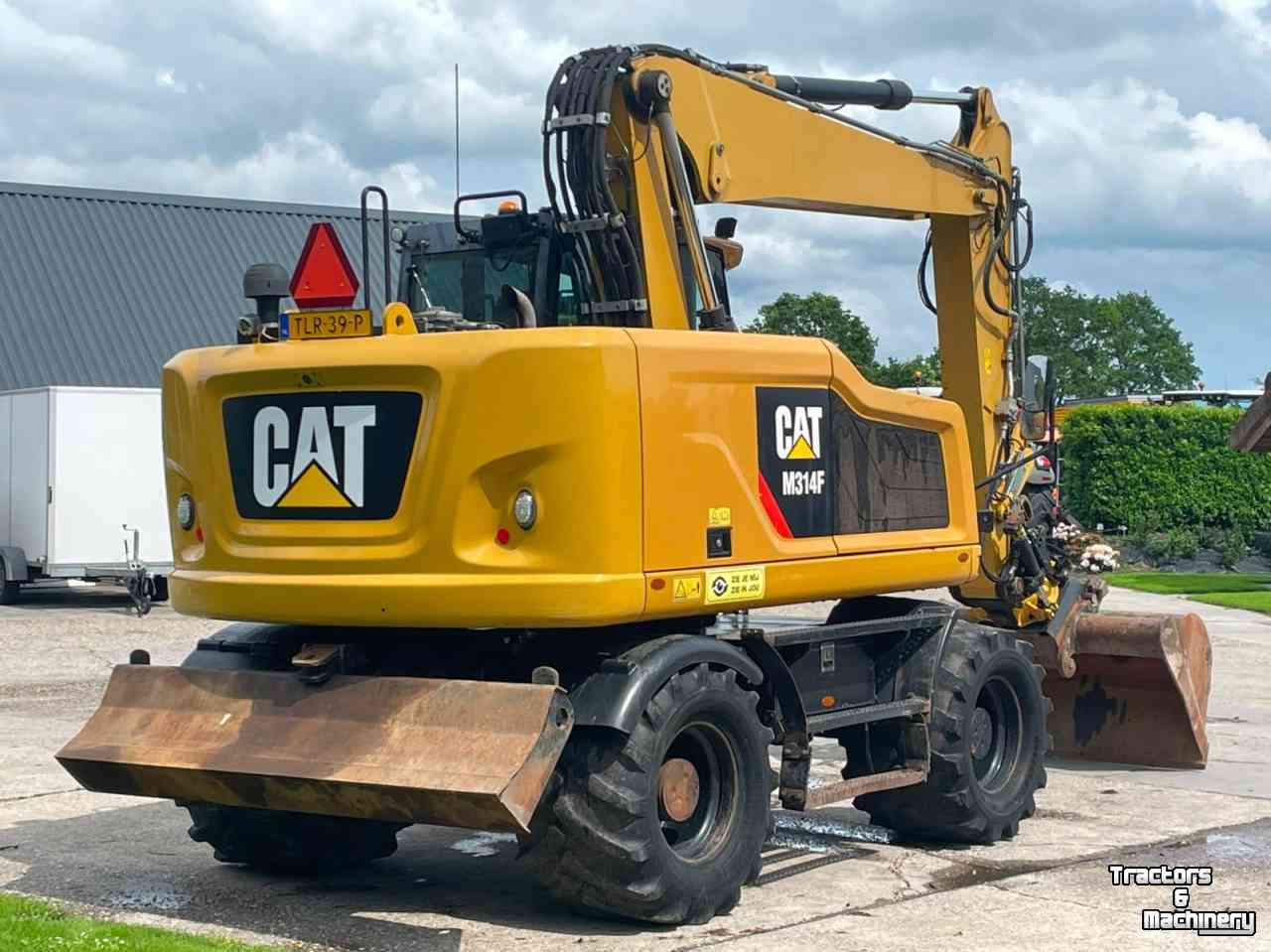 Bandenkraan / Graafmachine op wielen Caterpillar M314F mobiele kraan draaikantelstuk
