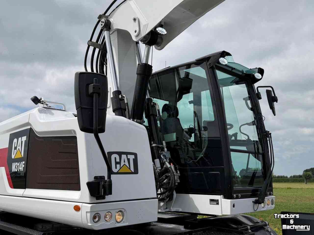 Bandenkraan / Graafmachine op wielen Caterpillar Cat M314F - Engcon  Mobiele graafmachine Midejo