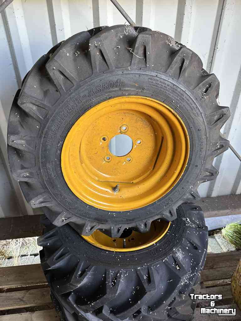 Wielen, Banden, Velgen & Afstandsringen  10.0/75-15.3 BKT inplement -AS504