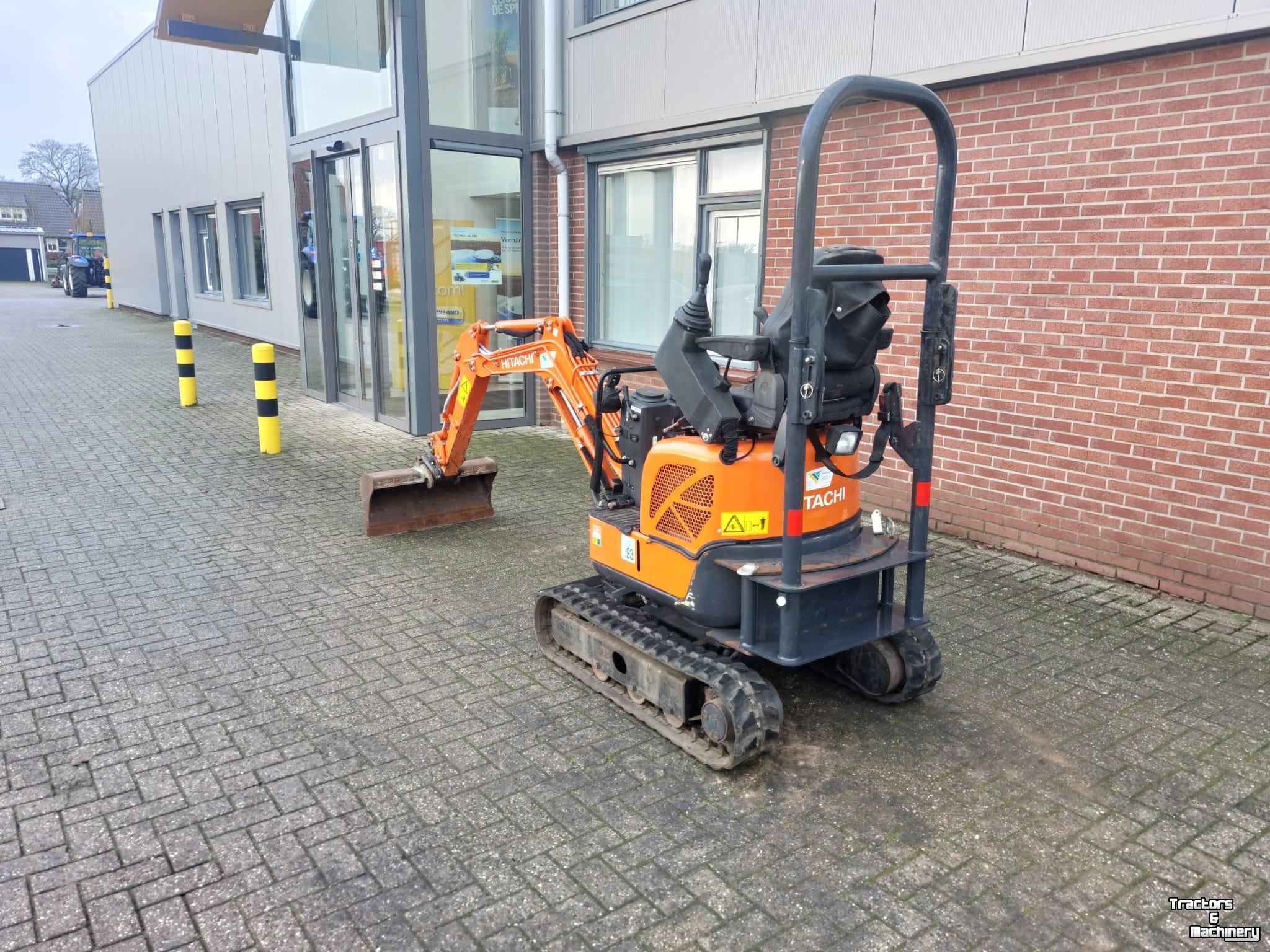 Bandenkraan / Graafmachine op wielen Hitachi 10U