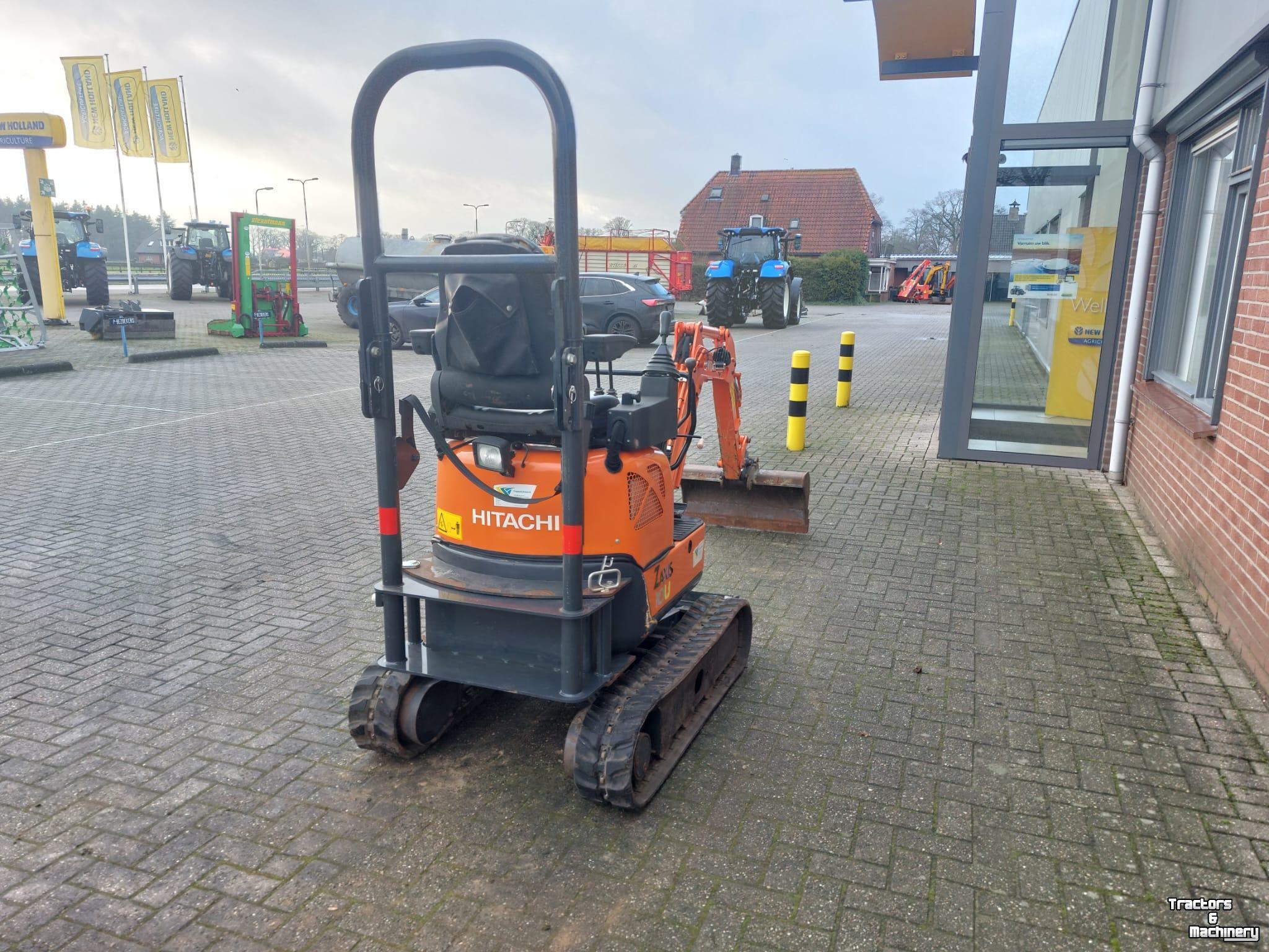 Bandenkraan / Graafmachine op wielen Hitachi 10U