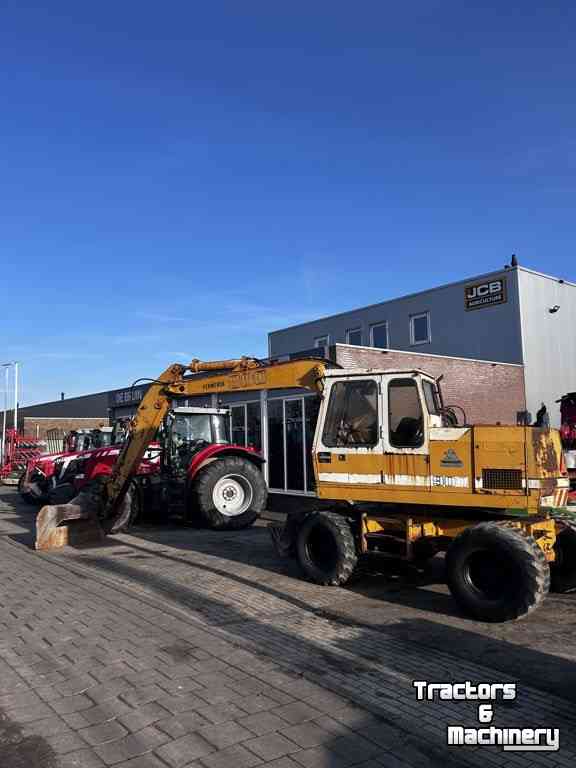 Bandenkraan / Graafmachine op wielen Liebherr 900