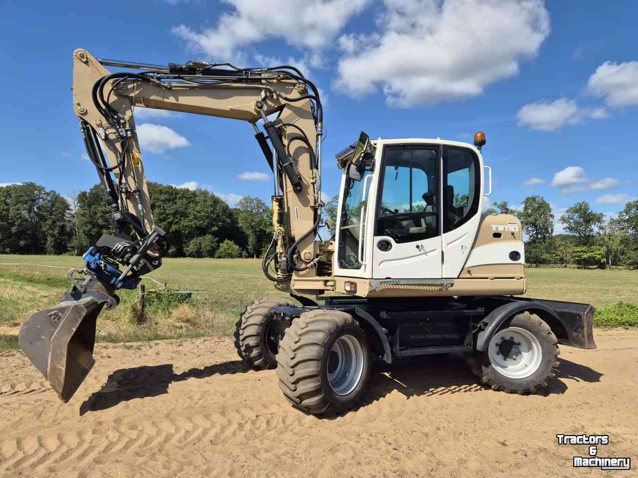 Bandenkraan / Graafmachine op wielen Terex TW 110