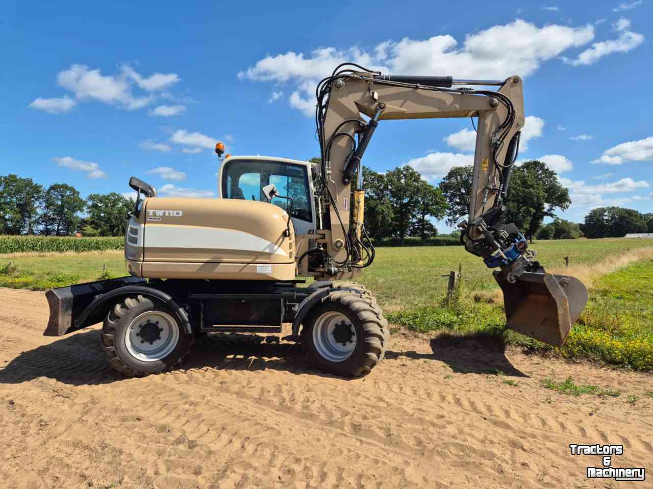 Bandenkraan / Graafmachine op wielen Terex TW 110