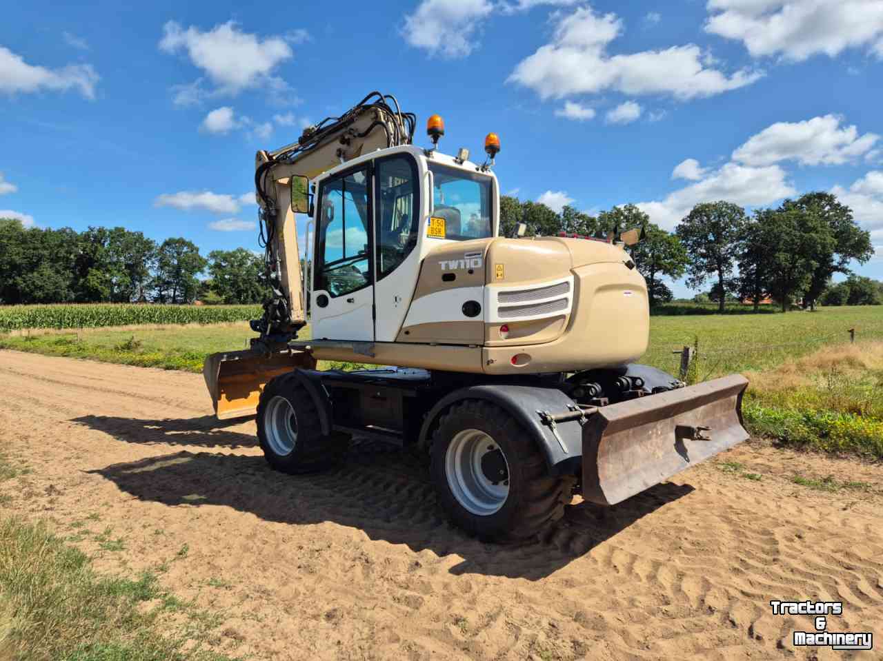Bandenkraan / Graafmachine op wielen Terex TW 110