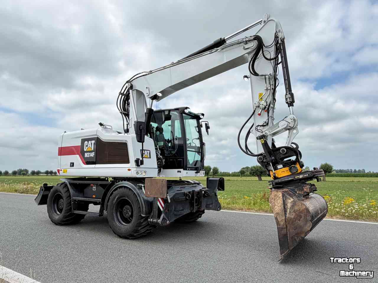 Bandenkraan / Graafmachine op wielen Caterpillar Cat M314F + Engcon Mobiele graafmachine Midejo
