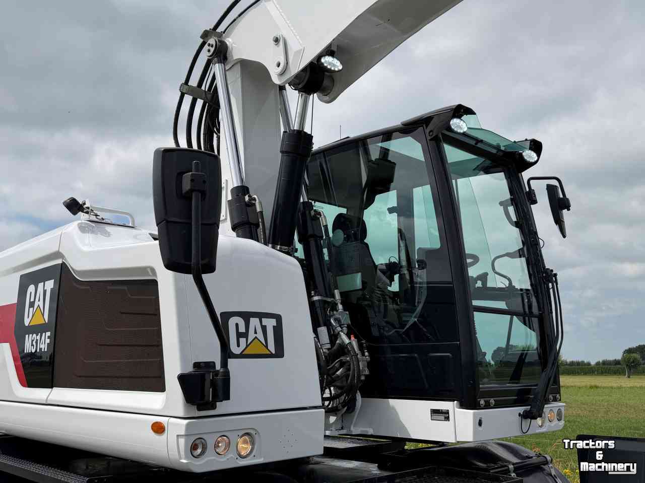 Bandenkraan / Graafmachine op wielen Caterpillar Cat M314F + Engcon Mobiele graafmachine Midejo
