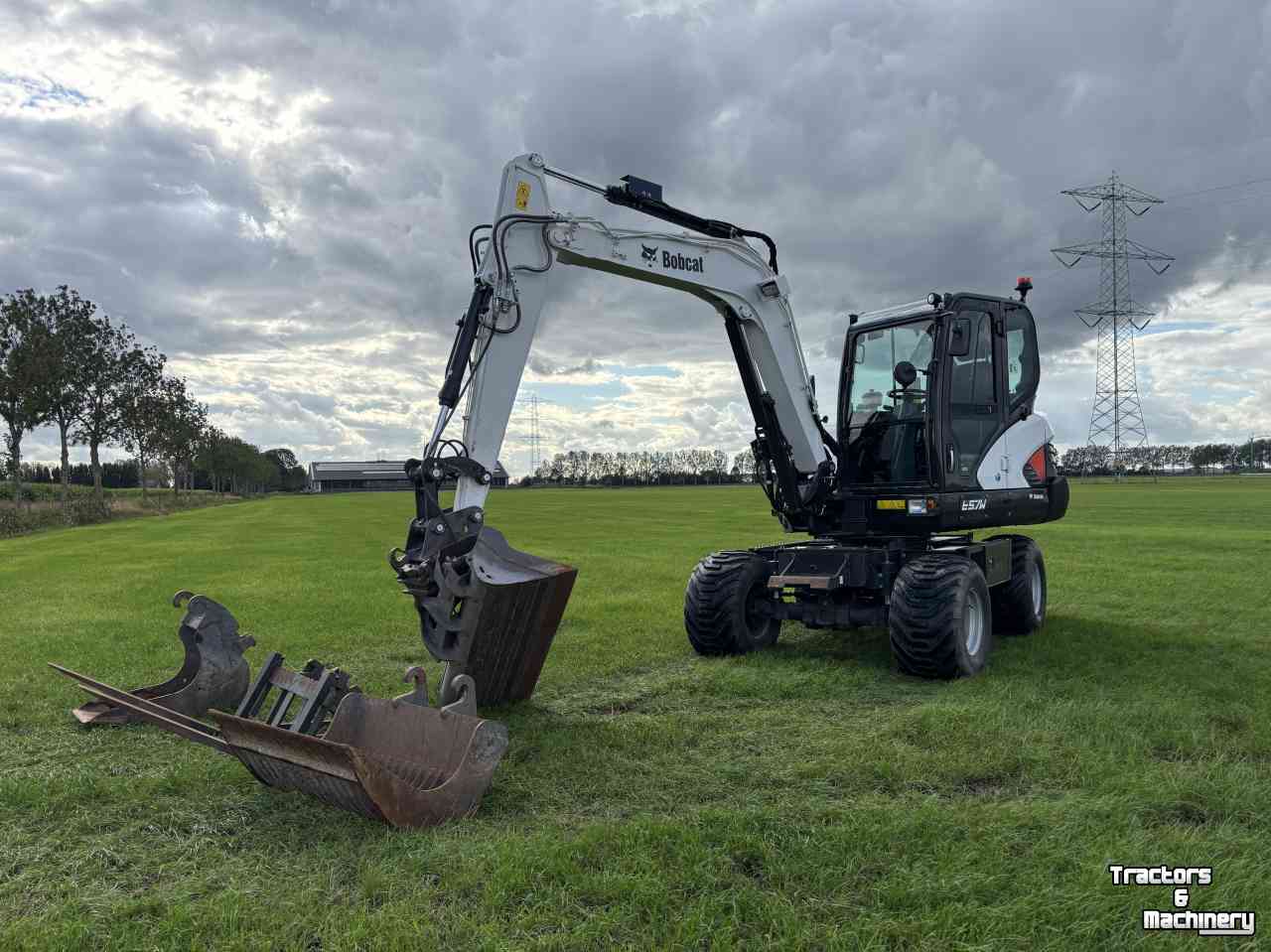 Bandenkraan / Graafmachine op wielen Bobcat E57W
