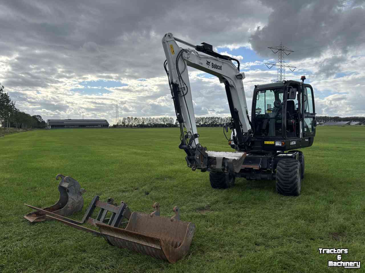 Bandenkraan / Graafmachine op wielen Bobcat E57W