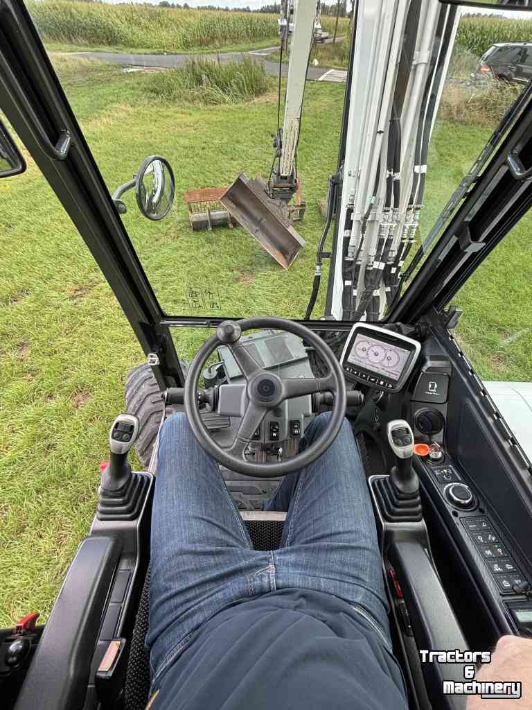 Bandenkraan / Graafmachine op wielen Bobcat E57W