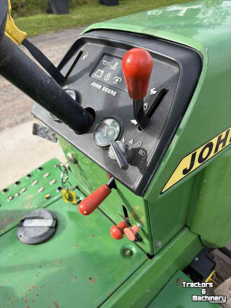 Compact tractor John Deere 655 Diesel 4wd met maaidek fronthef en veegmachine