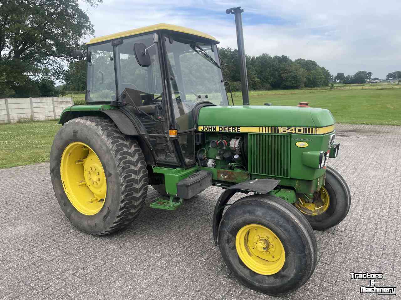 Tractor / Trekker John Deere 1640 MC-1 cab.