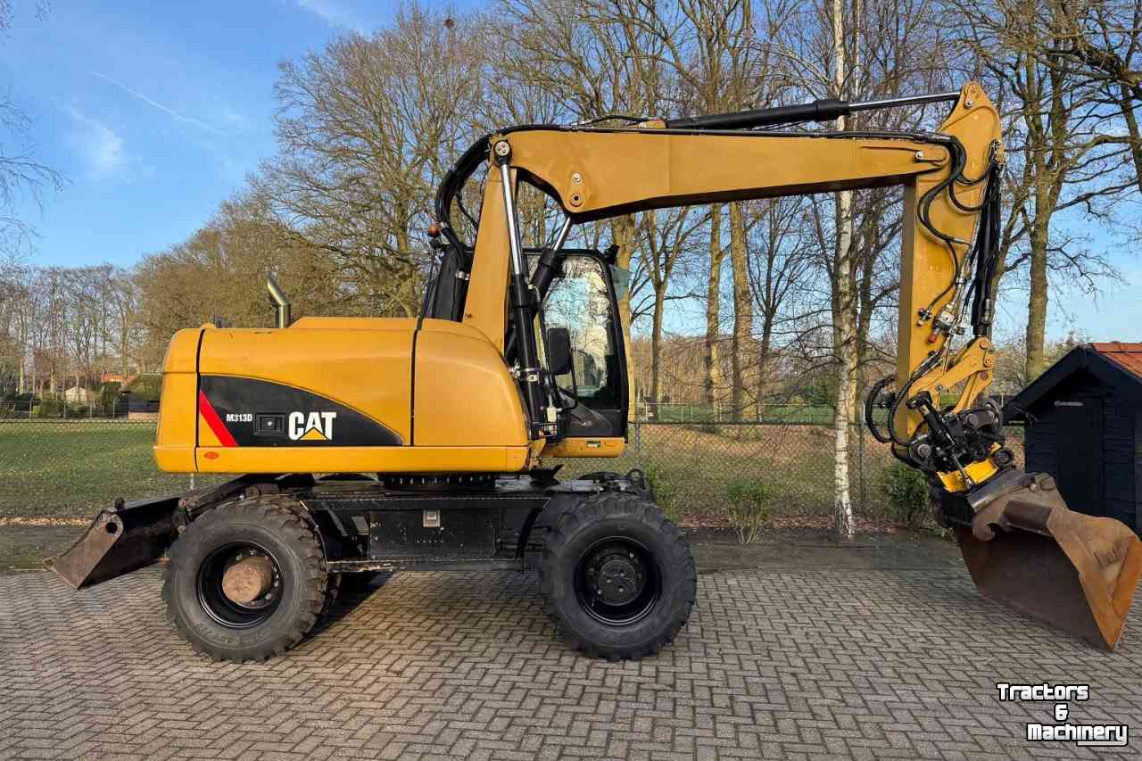 Bandenkraan / Graafmachine op wielen Caterpillar m313d Mobiele kraan