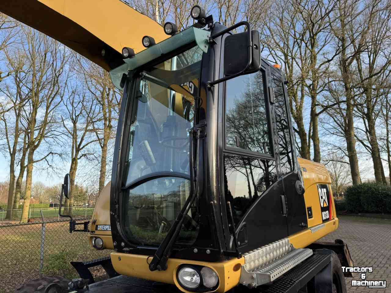 Bandenkraan / Graafmachine op wielen Caterpillar m313d Mobiele kraan