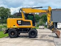 Bandenkraan / Graafmachine op wielen Caterpillar M314F mobiele kraan draaikantelstuk