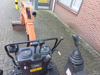 Bandenkraan / Graafmachine op wielen Hitachi 10U