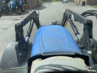 Tractor / Trekker New Holland T6030 + STOLL ROBUST FR.LDR.