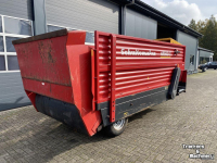 Blokkendoseerwagen Schuitemaker Amigo 40 kuilvoerblokkendoseerwagen