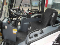 Werktuigendrager Multihog CX 75 werktuigdrager met Mc Connel arm klepelbak