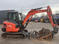 Bandenkraan / Graafmachine op wielen Kubota KX042-4