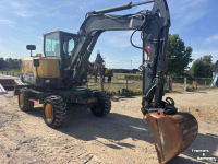 Bandenkraan / Graafmachine op wielen  Volvo ew60 mobiele kraan
