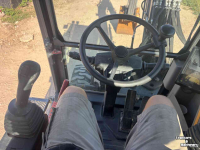 Bandenkraan / Graafmachine op wielen  Volvo ew60 mobiele kraan
