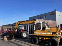 Bandenkraan / Graafmachine op wielen Liebherr 900