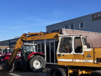 Bandenkraan / Graafmachine op wielen Liebherr 900