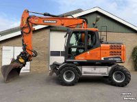 Graafmachine Doosan DX140w-5 met draaikantelstuk egcon