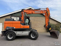 Graafmachine Doosan DX140w-5 met draaikantelstuk egcon