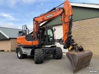 Graafmachine Doosan DX140w-5 met draaikantelstuk egcon