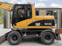 Bandenkraan / Graafmachine op wielen Caterpillar M313D
