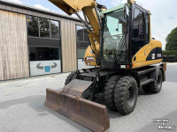 Bandenkraan / Graafmachine op wielen Caterpillar M313D