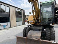 Bandenkraan / Graafmachine op wielen Caterpillar M313D