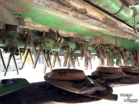 Maaier John Deere 328 DISC