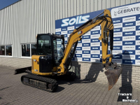 Bandenkraan / Graafmachine op wielen Caterpillar 303.5 graafmachine minigraver rupskraan