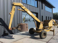 Graafmachine  Griesser 1614 getrokken kraan graafmachine op wielen met knijperbak