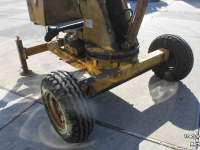 Graafmachine  Griesser 1614 getrokken kraan graafmachine op wielen met knijperbak