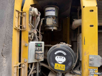 Bandenkraan / Graafmachine op wielen Komatsu PW180-10