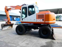 Bandenkraan / Graafmachine op wielen Atlas Mobiel 1304