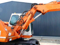 Bandenkraan / Graafmachine op wielen Atlas Mobiel 1304