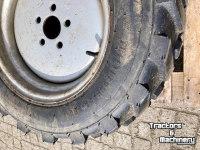 Wielen, Banden, Velgen & Afstandsringen Weidemann BKT + Trelleborg 27x8.50-15 Banden