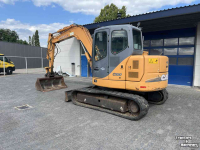 Rupskraan / Graafmachine op rupsen Case CX 80