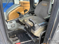 Rupskraan / Graafmachine op rupsen Case CX 80