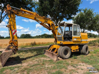 Bandenkraan / Graafmachine op wielen Liebherr A902