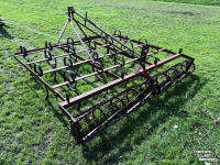 Cultivator  Triltand cultivator met verkruimelrol rol