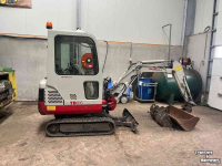 Rupskraan / Graafmachine op rupsen Takeuchi TB016 met machinetrailer