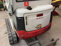 Rupskraan / Graafmachine op rupsen Takeuchi TB016 met machinetrailer